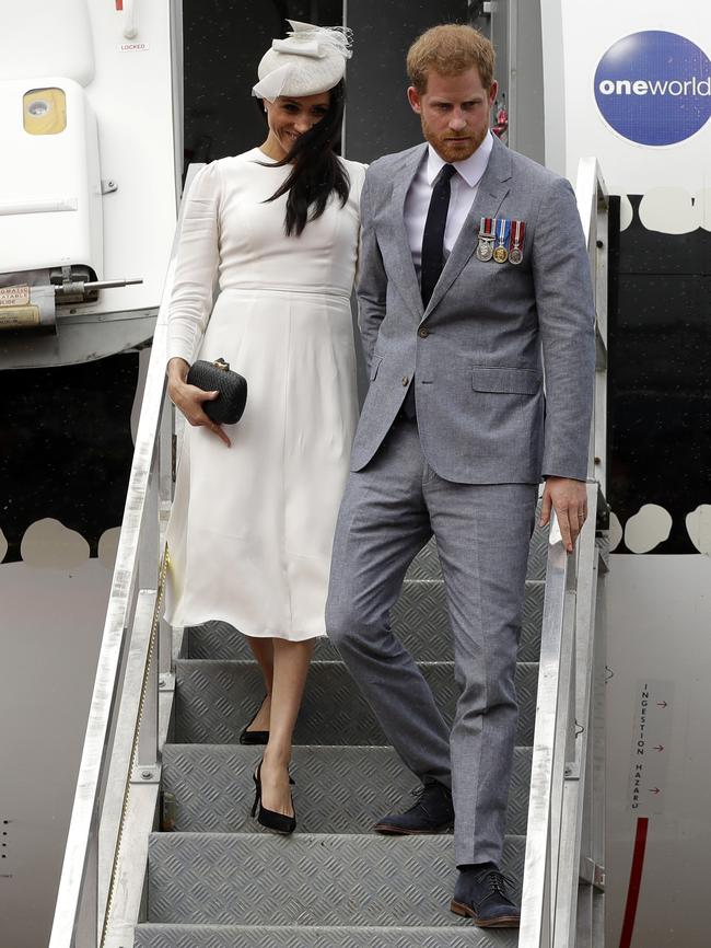 Prince Harry and Meghan disembark in Suva.