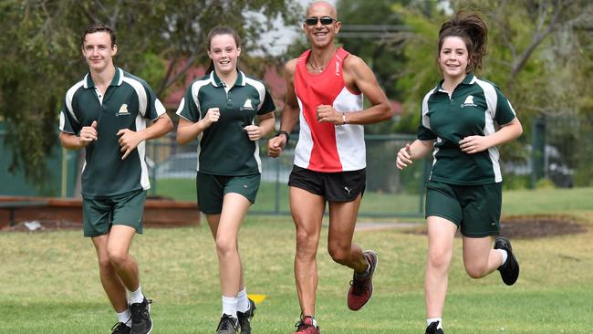 Gladstone Park Secondary College students Matt Watts, Courtney Jared and Tayla D'Asta with teacher Con Zanetidis during the Live for Lily relay. Picture: Kylie Else