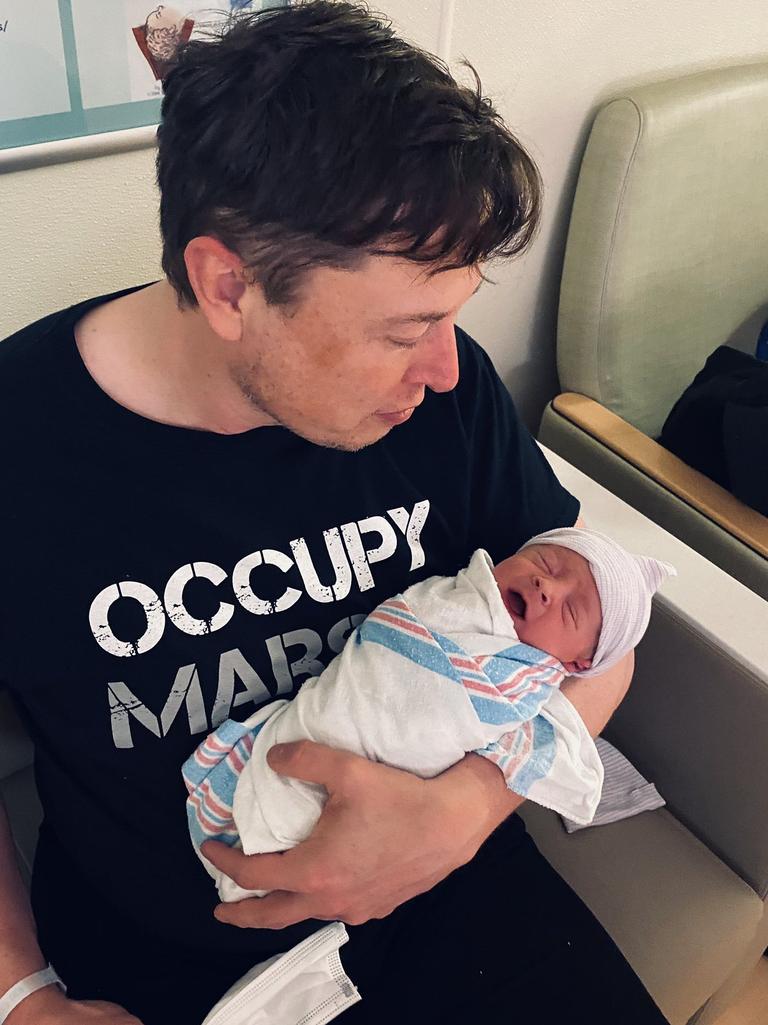 Musk with his first child with Grimes, a boy named X Æ A-XII. Picture: Twitter/@elonmusk