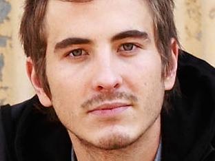 SYDNEY, AUSTRALIA - JUNE 07: Actor Ryan Corr, recipient of the AIF Heath Ledger Scholarship Award, poses on the set of the Australian television show "Packed to the Rafters" on June 7, 2011 in Sydney, Australia . Corr was unable to attend the Australians In Film's 2011 Breakthrough Awards Awards due to filming commitments in Australia. (Photo by Brendon Thorne/Getty Images for AIF)