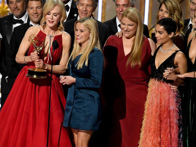 Nicole Kidman and Reese Witherspoon, with Bruna Papandrea, accepting the Outstanding Limited Series Emmy award for Little Big Lies. Picture:  Kevin Winter/Getty