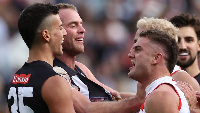 MELBOURNE. 07/05/2023. AFl.  Round 8. Collingwood vs Sydney at the MCG. Players punch on after Swans players got stuck into Nick Daicos of the Magpies after a Sydneys  Ryan Clarke 1st qtr goal   . Pic: Michael Klein