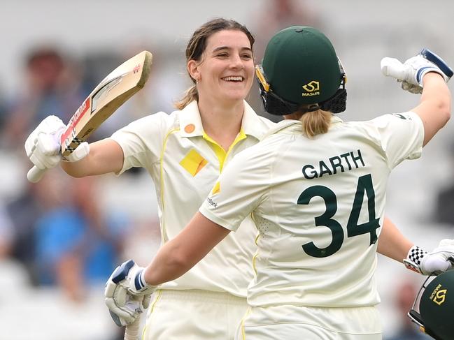 NOTTINGHAM, ENGLAND - JUNE 23: Australia batter Annabel Sutherland (l) celebrates reaching her century with Kim Garth during day two of the LV= Insurance Women's Ashes Test match between England and Australia at Trent Bridge on June 23, 2023 in Nottingham, England. (Photo by Stu Forster/Getty Images)