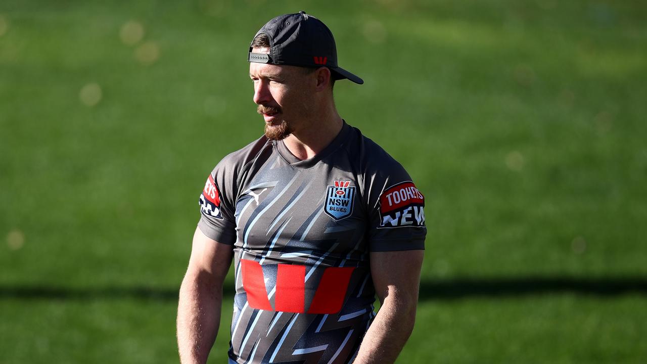 SYDNEY, AUSTRALIA - JUNE 14: Damien Cook of the Blues looks on during a New South Wales Blues State of Origin training session at Coogee Oval on June 14, 2023 in Sydney, Australia. (Photo by Jason McCawley/Getty Images)