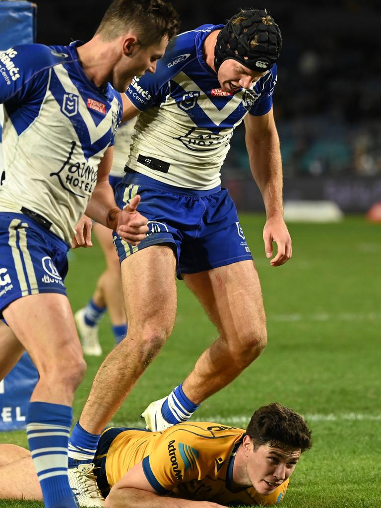 Matt Burton give it to Mitch Moses after his try-saving tackle. Picture: NRL Imagery