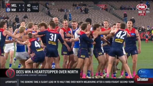 Melbourne Demons hold off fierce comeback from North