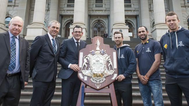 Geoff Tamblyn (far left) celebrates a Sheffield Shield win with (from left) Tony Dodemaide, Daniel Andrews, Matthew Wade, Fawad Ahmed and Peter Siddle. Picture: Eugene Hyland