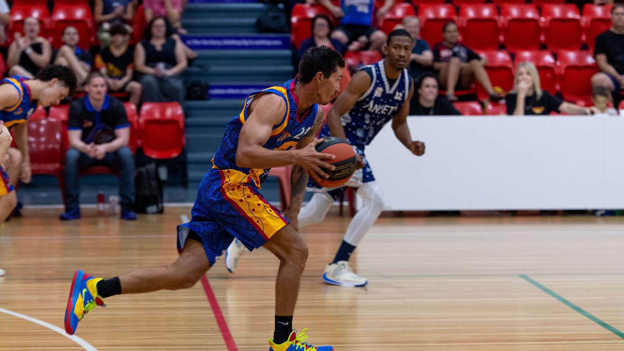 Liam MacLachlan from the Jets on a run down the court. Darwin Basketball Men's Championship Round 20: Ansett v Tracy Village Jets. Picture: Che Chorley