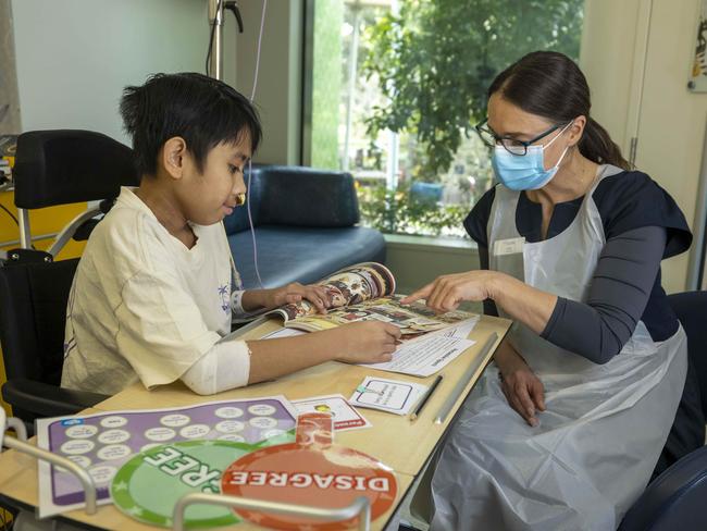 Student Joshua with teacher Lidia Foskett who is teaching persuasive text. Picture: Wayne Taylor