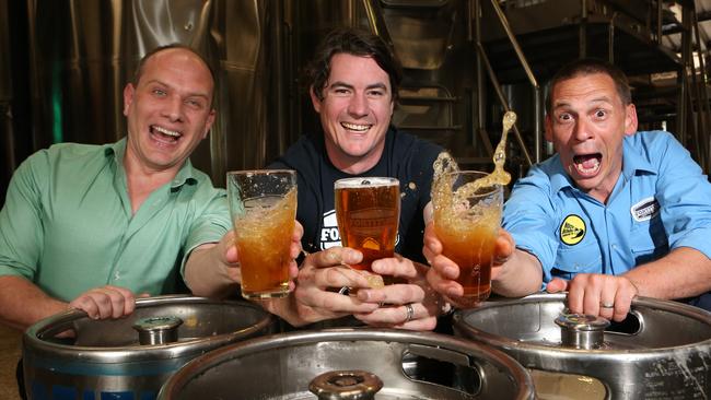 Gerard Connors (left), Jim O'Connor, and head brewer Ian Watson, Head Brewer of Fortitude Brewing Company at Mount Tamborine celebrate their Golden Ale being named a finalist for best draught beer in the 2015 Australian Liquor Industry Awards. Picture: Regi Varghese