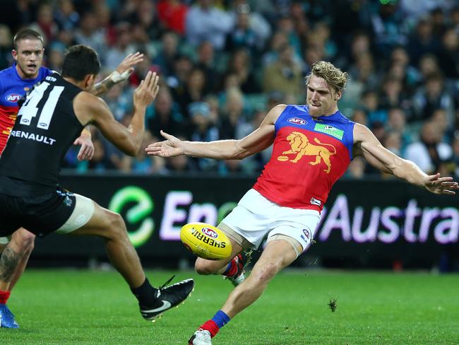 Tom Bell gets a kick away for Brisbane Lions. Picture: Sarah Reed