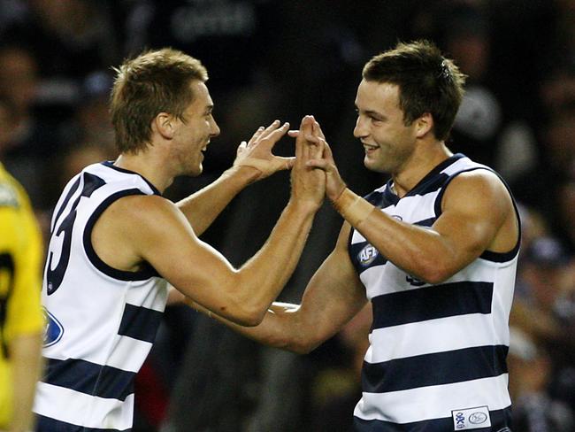 UK specialist Ryan Gamble celebrates with Jimmy Bartel.