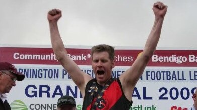 Jeremy Waixel gets his 2009 premiership medallion. Picture: SUPPLIED