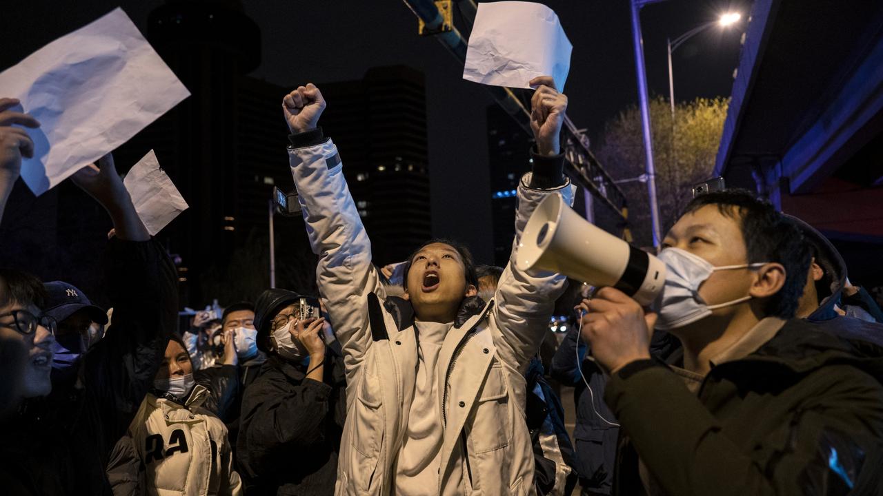 Demonstrations are being called the ‘white paper revolution’ as many protesters symbolically wave blank sheets of paper. Picture: Kevin Frayer/Getty Images