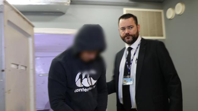 Four men have been arrested in relation to the February 15, 2020 death of Omar Elomar. They were arrested in a dawn raid on four homes in Western Sydney on May 26, 2022. Picture: NSW Police