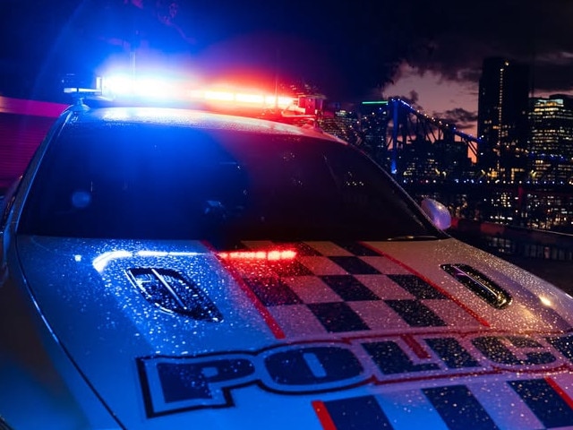 Generic picture of a Queensland Police car with lights flashing