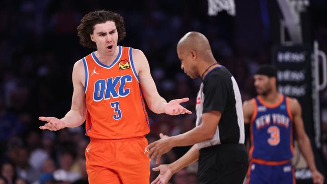 Josh Giddey #3 of the Oklahoma City Thunder reacts after a foul call during the first quarter of the game. Dustin Satloff/Getty Images/AFP (Photo by Dustin Satloff / GETTY IMAGES NORTH AMERICA / Getty Images via AFP)