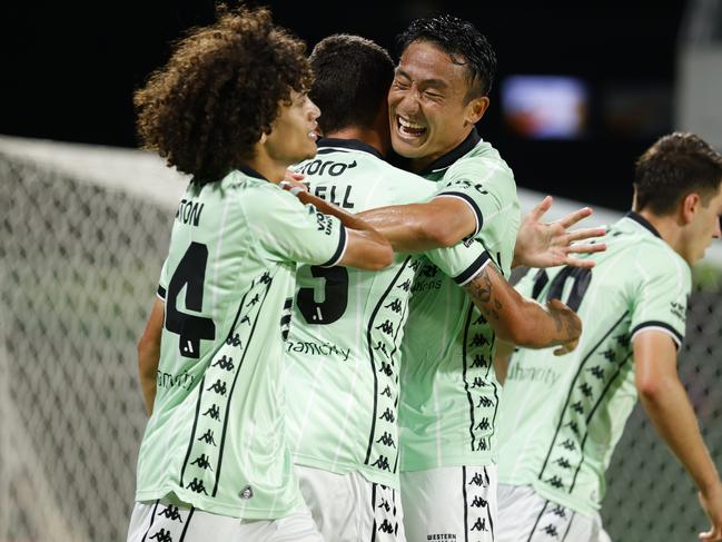 Western United celebrate their late winner against the Glory. Photo: James Worsfold/Getty Images.