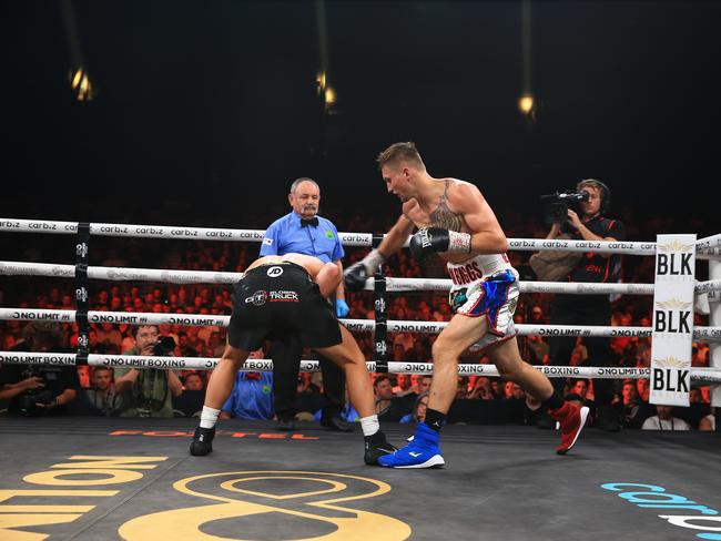 Biggs lands a shot on Nikita Tszyu. Picture: No Limit Boxing