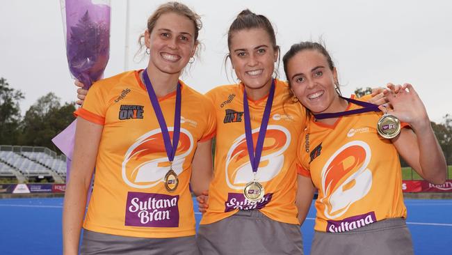 L-R: Brisbane Blaze Fitzpatrick sisters Madison, Kendra and Savannah after the Women's Hockey One Grand Final match with HC Melbourne in 2019. (AAP Image/Scott Barbour)