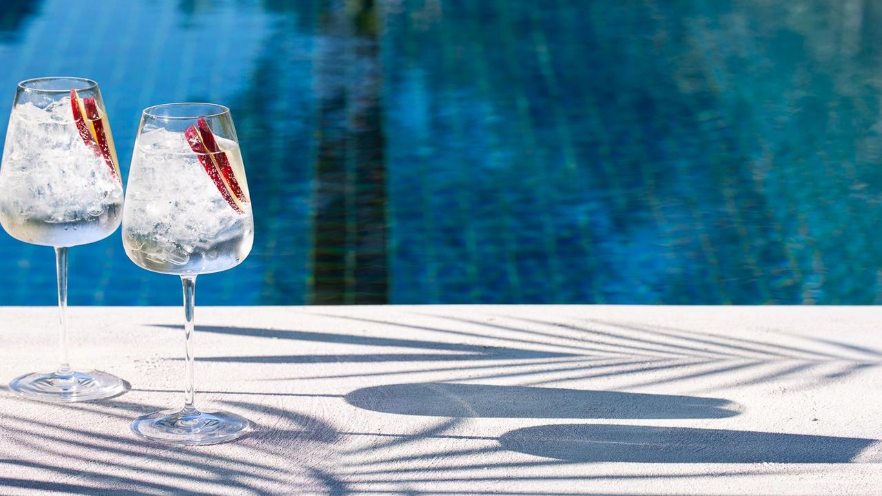 Sit back, relax and enjoy a drink by the pool.