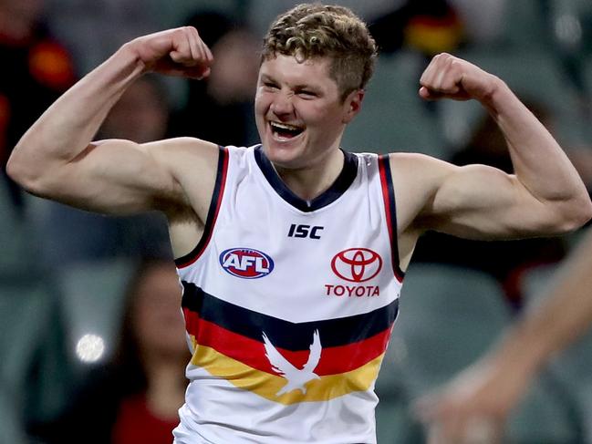 ADELAIDE, AUSTRALIA - SEPTEMBER 01: Harry Schoenberg of the Crows celebrates a goal during the 2020 AFL Round 15 match between the Hawthorn Hawks and the Adelaide Crows at Adelaide Oval on September 1, 2020 in Adelaide, Australia. (Photo by James Elsby/AFL Photos via Getty Images)