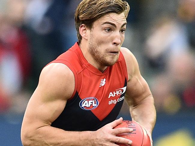 Jack Viney of the Demons (right) and Sam Mitchell of the Hawks contest during the Round 20 AFL match between the Melbourne Demons and the Hawthorn Hawks at the MCG in Melbourne, Saturday, Aug. 6, 2016. (AAP Image/Julian Smith) NO ARCHIVING, EDITORIAL USE ONLY