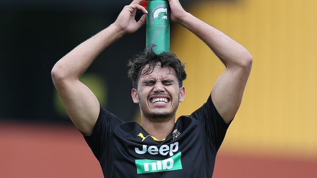 Sydney Stack feels the pinch at Richmond training. Picture: Michael Klein