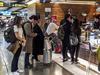 MADRID, SPAIN, DECEMBER - 2019 - People at bar, barajas airport, madrid, spain