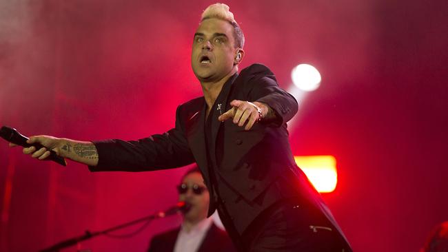 British singer Robbie Williams performs during the second day of the Pinkpop Music Festival in Landgraaf, on June 13, 2015. The music festival runs from June 12 to 14 . AFP PHOTO /ANP / PAUL BERGEN =NETHERLANDS OUT=