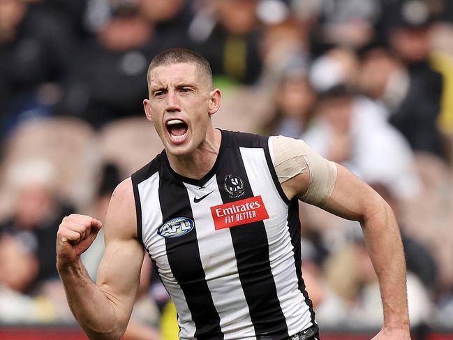 MELBOURNE, JULY 28, 2024: 2024 AFL Football – Round 20 – Collingwood Magpies V Richmond Tigers at the MCG. Darcy Cameron of the Magpies celebrates a goal. Picture: Mark Stewart