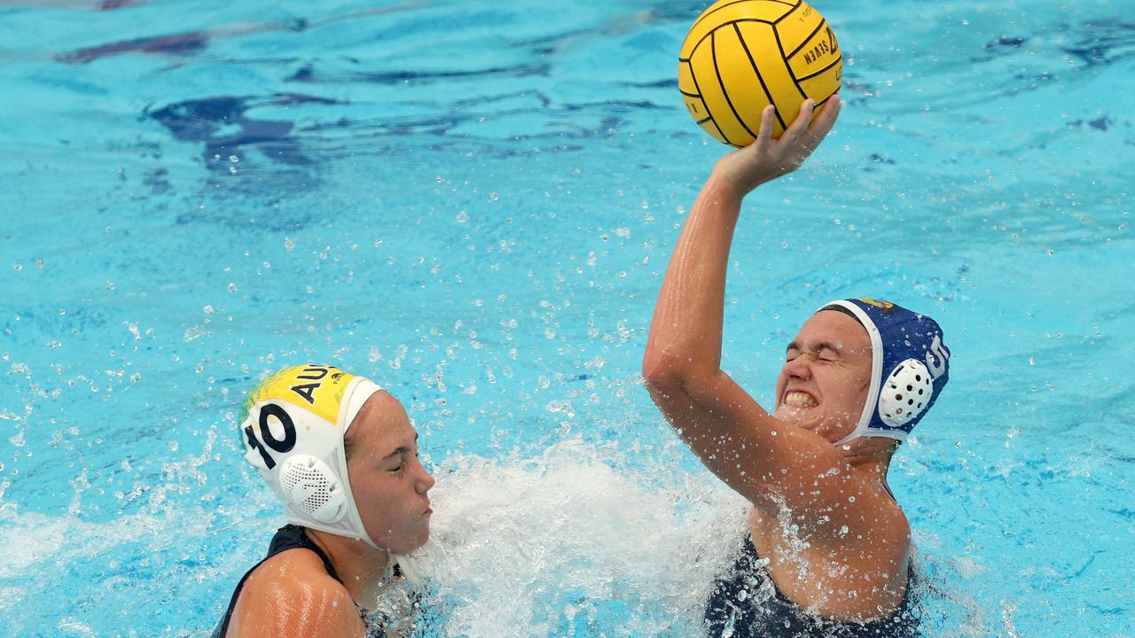 <p>Charley Porter of South Australia under pressure from Meg Hofstee of the Youth Barbarians.</p>