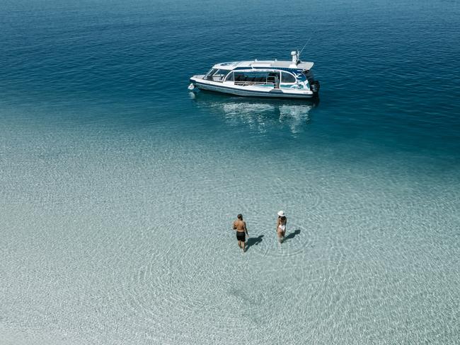 K'gari. Couple on tour from Kingfisher Bay Resort - West Coast Cruise. Escape 12 November 202372hrs - K'GariPhoto - supplied by Kingfisher Bay Resort