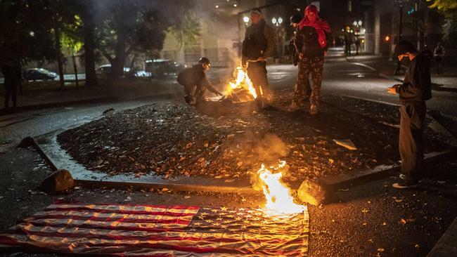 A group of racial-justice protesters in front of the Multnomah County Justice Centre in Portland, Oregon, on Wednesday. Picture: Getty Images