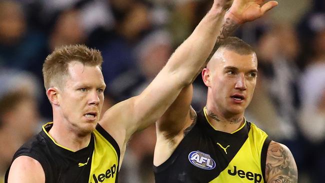 MELBOURNE, AUSTRALIA - AUGUST 03: Jack Riewoldt of the Tigers celebrates after kicking a goal with Dustin Martin of the Tigers during the round 20 AFL match between the Richmond Tigers and the Geelong Cats at Melbourne Cricket Ground on August 3, 2018 in Melbourne, Australia. (Photo by Scott Barbour/Getty Images)