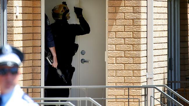 Police investigating the house where the incident took place. Picture: Toby Zerna