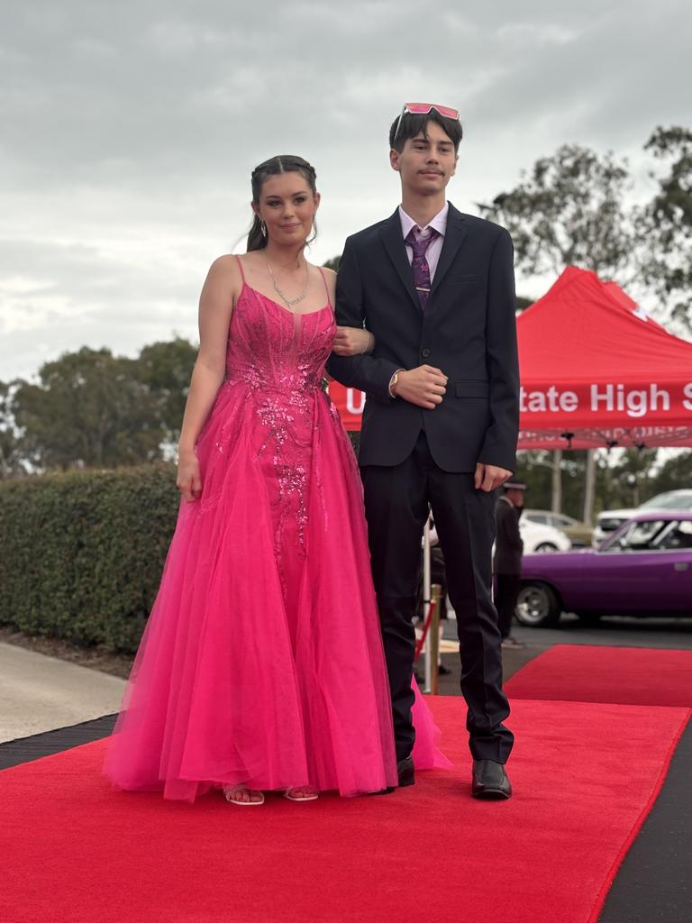 The students of Urangan State High School arriving at their formal.