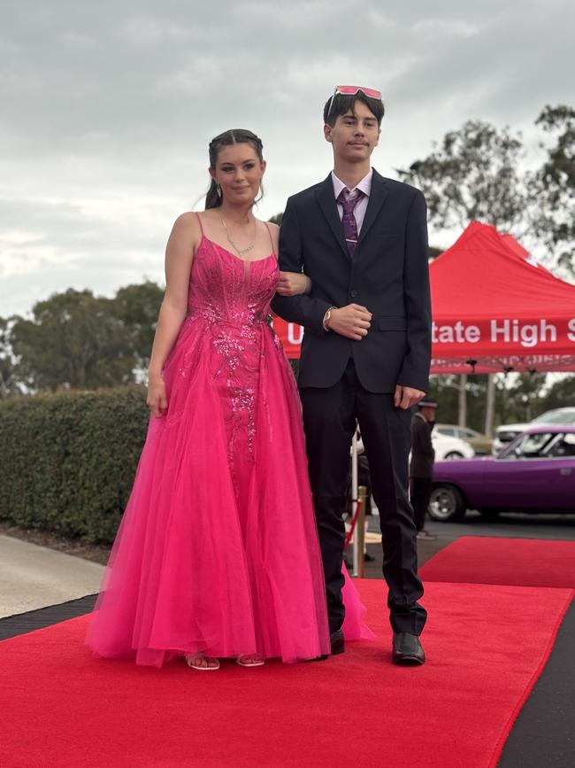 The students of Urangan State High School arriving at their formal.