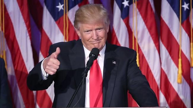 Republican president-elect Donald Trump flashes his famed thumbs-up during his acceptance speech after securing victory. Mark Wilson/Getty Images/AFP