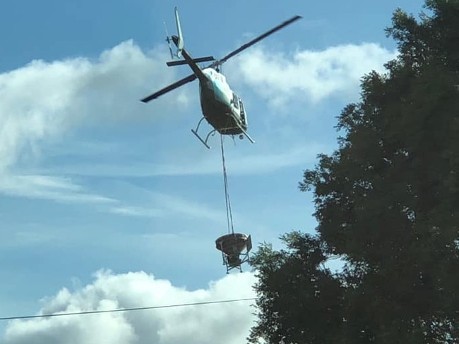 Ian Scott took this photo of the chopper spreading seed.