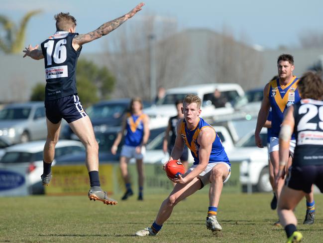 Cranbourne’s Jarryd Barker sells some candy. Picture: AAP/ Chris Eastman