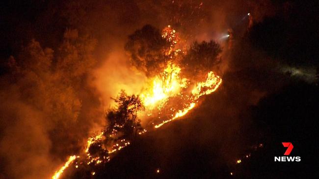 Caravan park residents were forced to flee their homes when a fire broke out at Brown Hill Creek in Mitcham. Police are also investigating a fire on a walking trail at nearby Panorama. Picture: 7NEWS