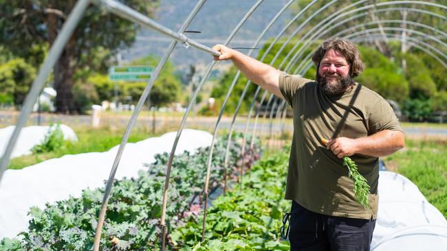 Josh Collings on his Acres and Acres cooperative market garden at Corryong. Pictures: Simon Dallinger