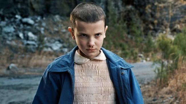 Bobby Brown as she first found fame, as Eleven in the first season of Stranger Things.