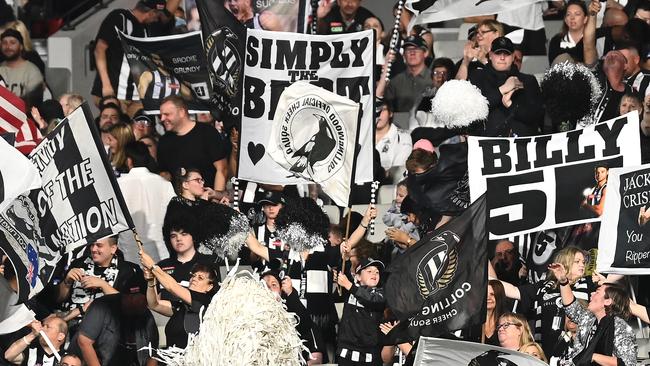 Magpies fans show their support during the round one AFL match