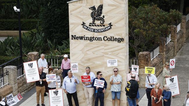 Parents and Old Boys of Newington College protested as boys arrived for their first day of the new school year. Picture: Richard Dobson