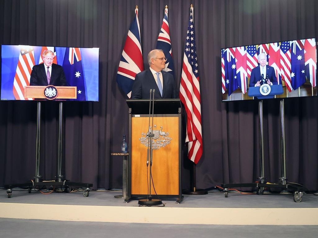 Scott Morrison announces the AUKUS pact last year with counterparts Boris Johnson and Joe Biden. Picture: Gary Ramage