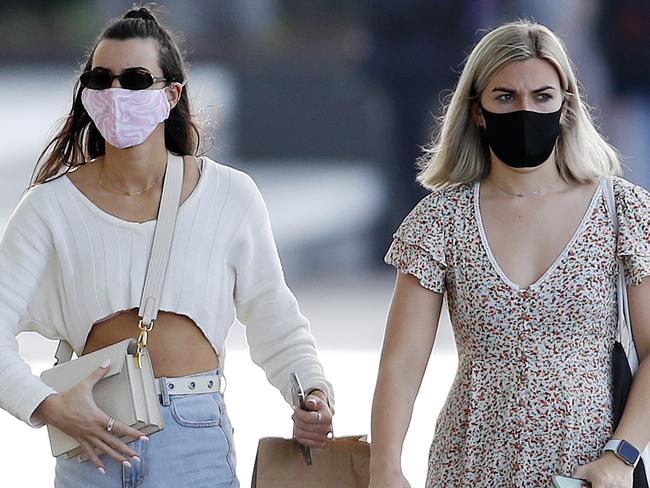 People pictured in public wearing masks in the Brisbane CBD, Brisbane 15th of July 2021.  Covid-19 mask wearing restrictions have been extended for another seven days in Brisbane.  (Image/Josh Woning)