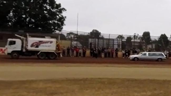 The hearse carrying Steven Wheeler’s coffin was taken for several laps around the Kingaroy Speedway, where the 54-year-old had been a member and fixture since he was a teenager. His parents Bob and Margaret were taken on a single lap of the track before Mr Wheeler’s hearse arrived, escorted by a water truck and a support vehicle. Pictures: Generation Funerals live stream.