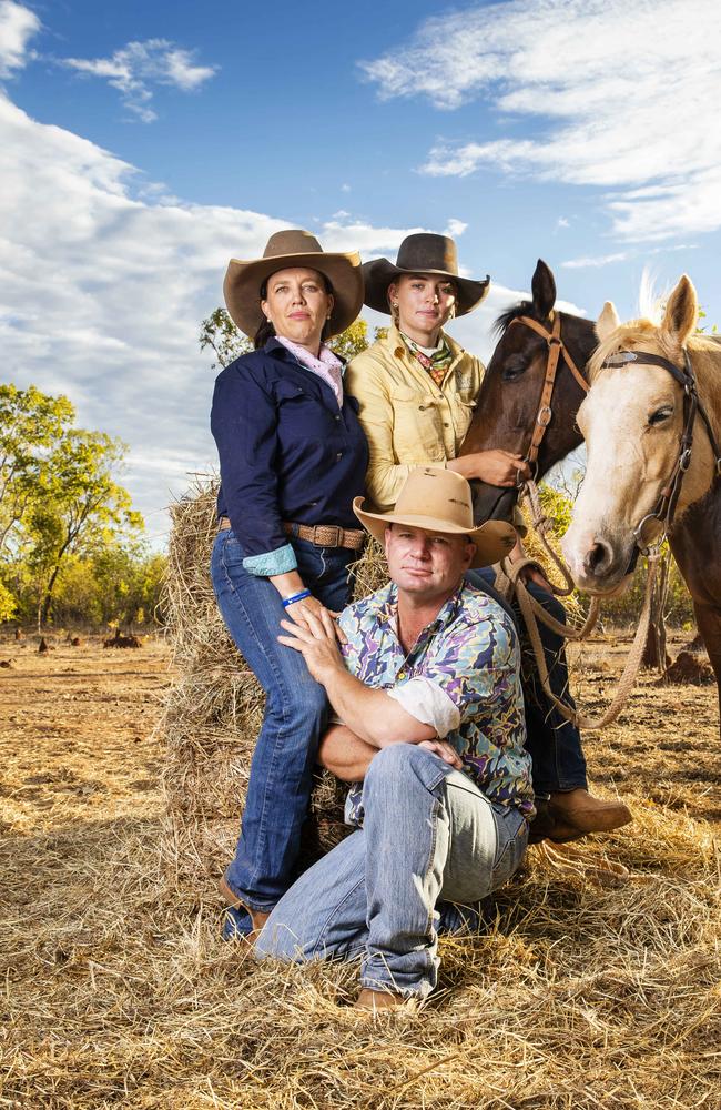 Kate and Tick Everett with their oldest daughter Meg and their horses at home on the family property near Katherine. Photo Lachie Millard